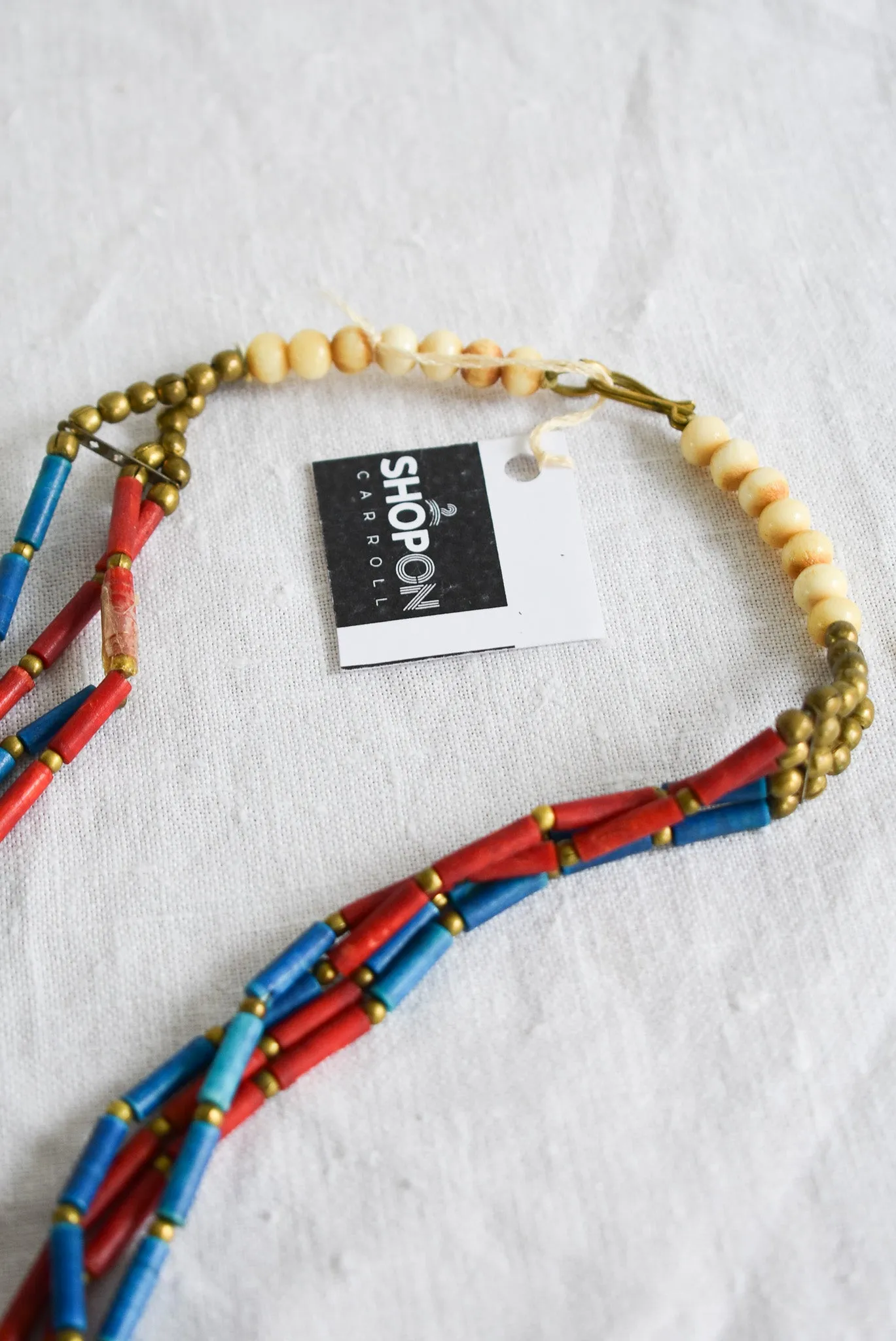 Statement bone, wood & brass beaded necklace